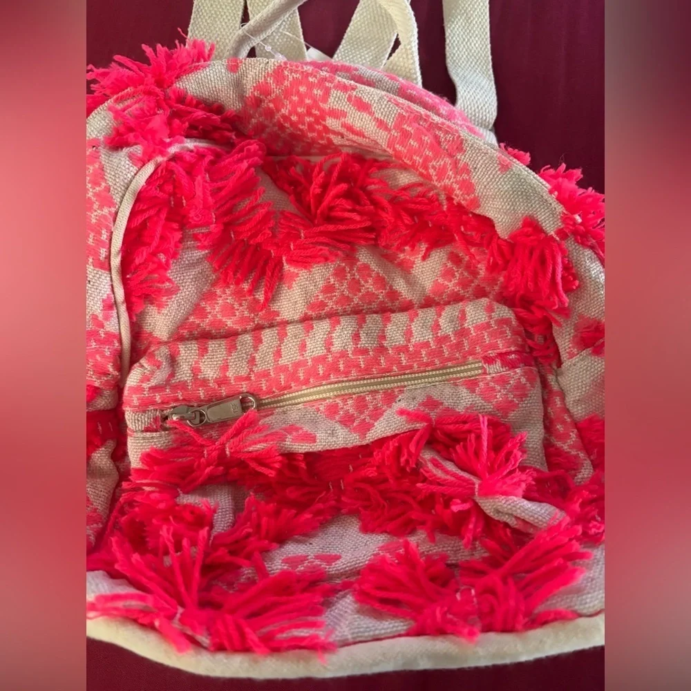nwt- Stylish Hot Pink  Whimsical Fringe  asymmetrical design  Festival bag